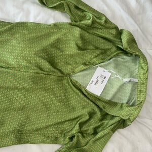 Button down blouse. Size L. Never worn.